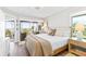 Main bedroom with ocean view and a comfortable bed at 5000 Gasparilla Rd # Dc307, Boca Grande, FL 33921