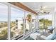 Screened lanai with ocean view and comfy seating at 5000 Gasparilla Rd # Dc307, Boca Grande, FL 33921