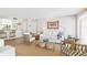 Bright living room featuring a comfy white couch and wicker chairs at 5000 Gasparilla Rd # Dc307, Boca Grande, FL 33921