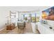 Living room with ocean views, comfy seating, and large TV at 5000 Gasparilla Rd # Dc307, Boca Grande, FL 33921