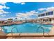 Resort-style pool with ocean views and lounge chairs at 5000 Gasparilla Rd # Dc307, Boca Grande, FL 33921