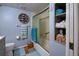 Clean bathroom with a shower/tub combo and light blue walls at 5031 N Beach Rd # 112, Englewood, FL 34223