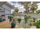 Deck with potted plants, offering a relaxing outdoor space at 5031 N Beach Rd # 112, Englewood, FL 34223
