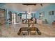 Kitchen with a view into the living room and dining area at 5031 N Beach Rd # 112, Englewood, FL 34223