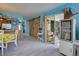 Open concept living room with sliding doors to outdoor space at 5031 N Beach Rd # 112, Englewood, FL 34223