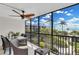 Screened balcony overlooking ocean and lush landscaping at 5700 Gulf Shores Dr # B234, Boca Grande, FL 33921