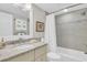 Second bathroom with tub shower combination and updated fixtures at 5700 Gulf Shores Dr # B234, Boca Grande, FL 33921