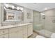 Updated bathroom with walk-in shower and modern vanity at 5700 Gulf Shores Dr # B234, Boca Grande, FL 33921