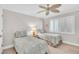 Guest bedroom with twin beds and plenty of natural light at 5700 Gulf Shores Dr # B234, Boca Grande, FL 33921