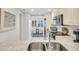 Updated kitchen with granite counters and stainless steel appliances at 5700 Gulf Shores Dr # B234, Boca Grande, FL 33921