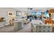 Living area featuring ocean view and comfortable seating at 5700 Gulf Shores Dr # B234, Boca Grande, FL 33921