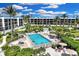 Resort-style pool and deck area with plenty of seating for residents and guests at 5700 Gulf Shores Dr # B234, Boca Grande, FL 33921