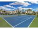Two well-maintained tennis courts with green and blue surface at 5700 Gulf Shores Dr # B234, Boca Grande, FL 33921