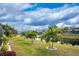 Peaceful backyard oasis with canal view and lush landscaping at 60 White Marsh Ln, Rotonda West, FL 33947
