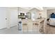 Modern kitchen with granite countertops and stainless steel appliances at 60 White Marsh Ln, Rotonda West, FL 33947