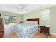 Spacious main bedroom with access to the pool area at 60 White Marsh Ln, Rotonda West, FL 33947