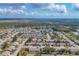 Aerial view of single home in community setting at 610 Apple Ln, Englewood, FL 34223