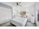Bedroom with double bed and white built-in closet at 610 Apple Ln, Englewood, FL 34223