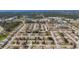 Aerial view of community with many homes and green spaces at 610 Apple Ln, Englewood, FL 34223