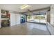 Bright and spacious garage with ample storage and laundry area at 610 Apple Ln, Englewood, FL 34223