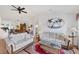 Relaxing living room with hardwood floors, two sofas, and a coffee table at 610 Apple Ln, Englewood, FL 34223