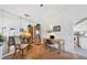 Home office features built-in desk and view into kitchen at 610 Apple Ln, Englewood, FL 34223