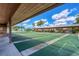 Community shuffleboard courts under covered area at 610 Apple Ln, Englewood, FL 34223