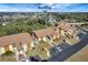 Aerial view of condo building and surrounding landscape at 6699 San Casa Dr # S1, Englewood, FL 34224