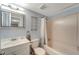 Clean bathroom with tub and shower combination at 6699 San Casa Dr # S1, Englewood, FL 34224