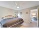 Main bedroom with a king-size bed at 6699 San Casa Dr # S1, Englewood, FL 34224