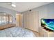 Spacious bedroom with mirrored closet doors at 6699 San Casa Dr # S1, Englewood, FL 34224