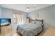 Bright bedroom with a comfortable bed and large closet at 6699 San Casa Dr # S1, Englewood, FL 34224