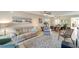 Open concept living and dining area with neutral tones at 6699 San Casa Dr # S1, Englewood, FL 34224