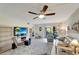 Living room features a sliding door to the patio at 6699 San Casa Dr # S1, Englewood, FL 34224