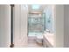 Updated bathroom with a walk-in shower and modern vanity at 808 Tangerine Woods Blvd, Englewood, FL 34223