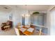 Dining area features a built-in hutch and wood table at 808 Tangerine Woods Blvd, Englewood, FL 34223