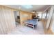 Fun game room, including a ping pong table and access to bedroom at 808 Tangerine Woods Blvd, Englewood, FL 34223