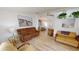 Spacious living room with comfy seating and light, airy feel at 808 Tangerine Woods Blvd, Englewood, FL 34223