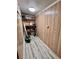 Storage room with shelving for various items at 808 Tangerine Woods Blvd, Englewood, FL 34223
