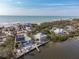 Aerial view showcasing waterfront homes with ocean and river views at 8245 Manasota Key Rd, Englewood, FL 34223