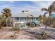 Two-story home, metal roof, waterfront location at 8245 Manasota Key Rd, Englewood, FL 34223