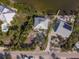 Aerial view of waterfront home with private road access at 8245 Manasota Key Rd, Englewood, FL 34223