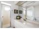 Guest bathroom with shower and vanity at 8245 Manasota Key Rd, Englewood, FL 34223