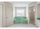 Bathroom with a green marble bathtub and shower at 8245 Manasota Key Rd, Englewood, FL 34223