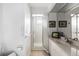 Bathroom with shower, vanity and grab bars at 8245 Manasota Key Rd, Englewood, FL 34223