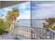 Steps lead to a waterfront deck with stunning water views at 8245 Manasota Key Rd, Englewood, FL 34223