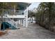 Elevated home with covered parking and waterfront access at 8245 Manasota Key Rd, Englewood, FL 34223