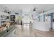 Open floor plan showing kitchen, dining and living areas at 8245 Manasota Key Rd, Englewood, FL 34223