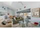 Spacious living area featuring water views and ample natural light at 8245 Manasota Key Rd, Englewood, FL 34223