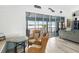 Relaxing sitting area with wicker chairs and waterfront views at 8245 Manasota Key Rd, Englewood, FL 34223